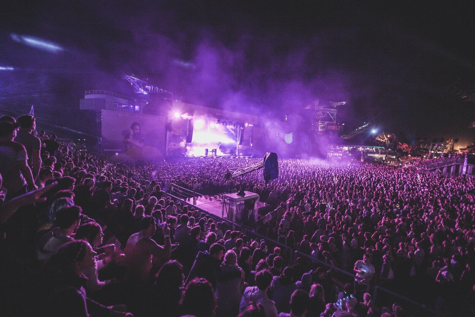 Large concert crowd at a sound and lighting production